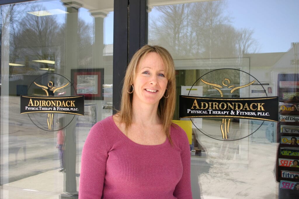 Natalie Barber outside the office front doors